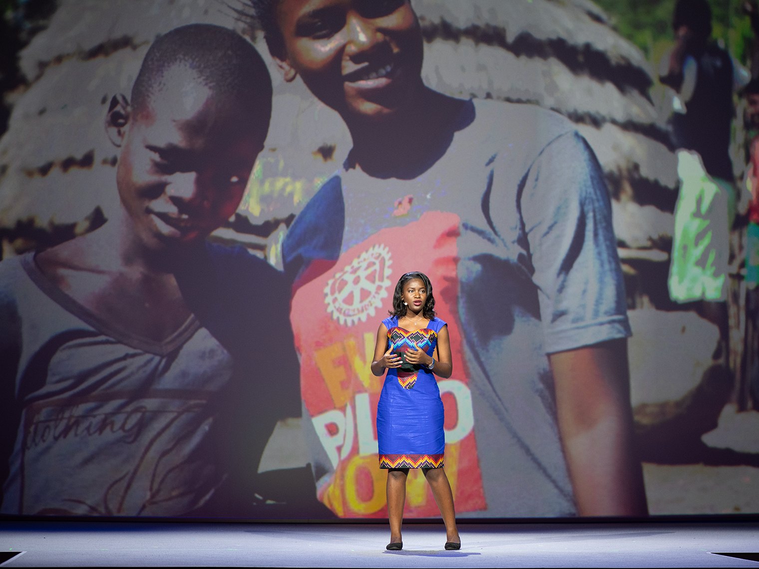 Patience Asiimwe on stage at the Rotary International Convention in Hamburg, Germany