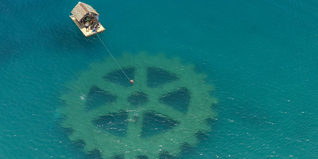 An aerial view of the artificial reef off Atimonan, Philippines, built in the shape of the Rotary wheel