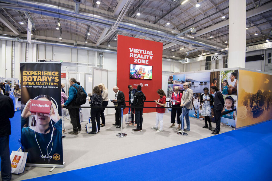 Delegates queuing to experience the films at the Rotary Virtual Reality Zone