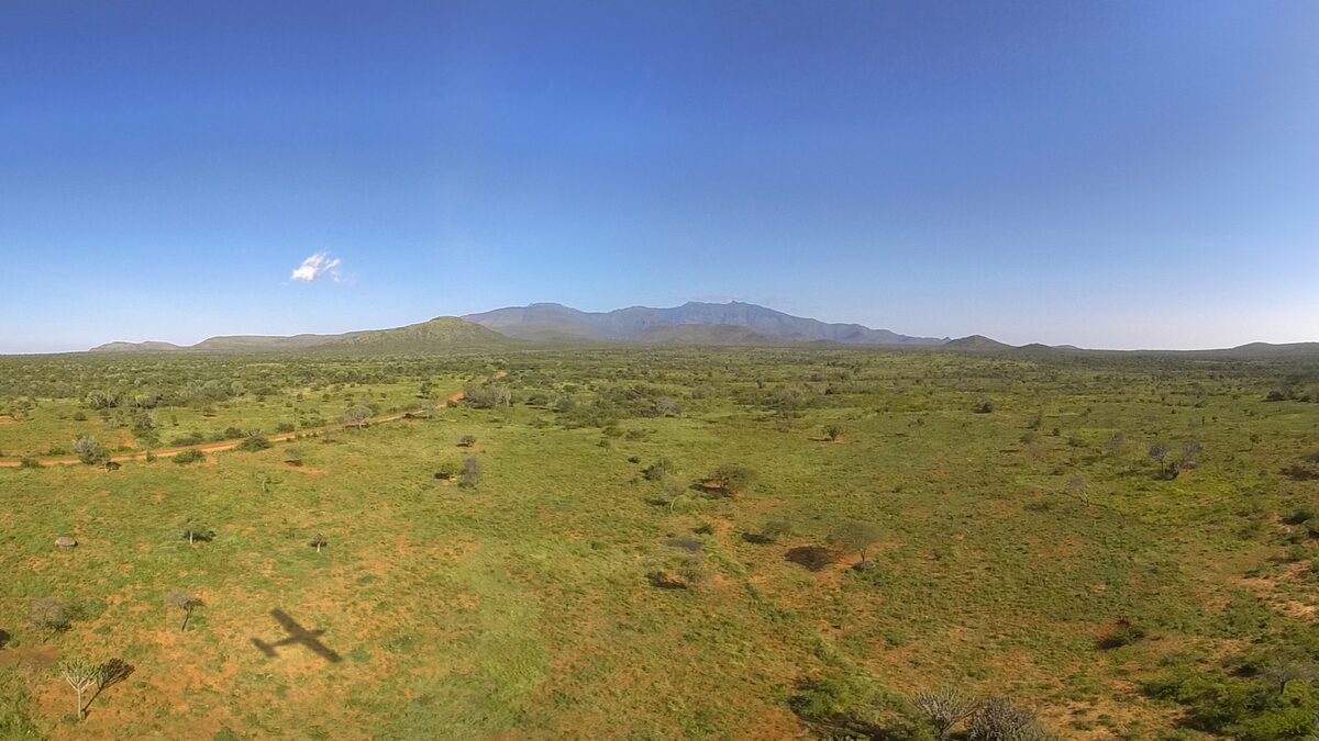 The remote landscape still to cross, with mountains on the horizon