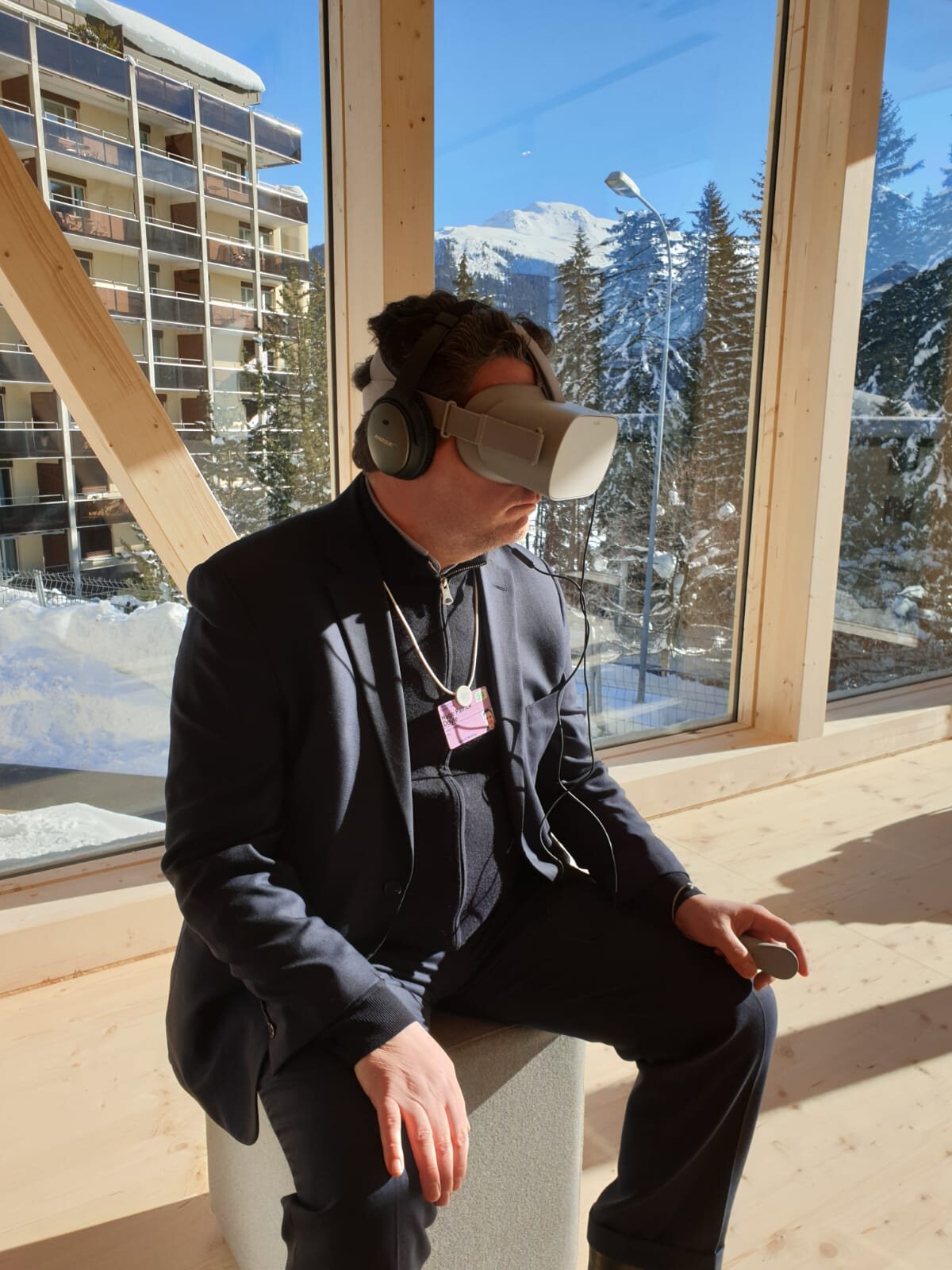 A World Economic Forum delegate immersed in a UNICEF360 film on an Oculus headset, Davos 2022